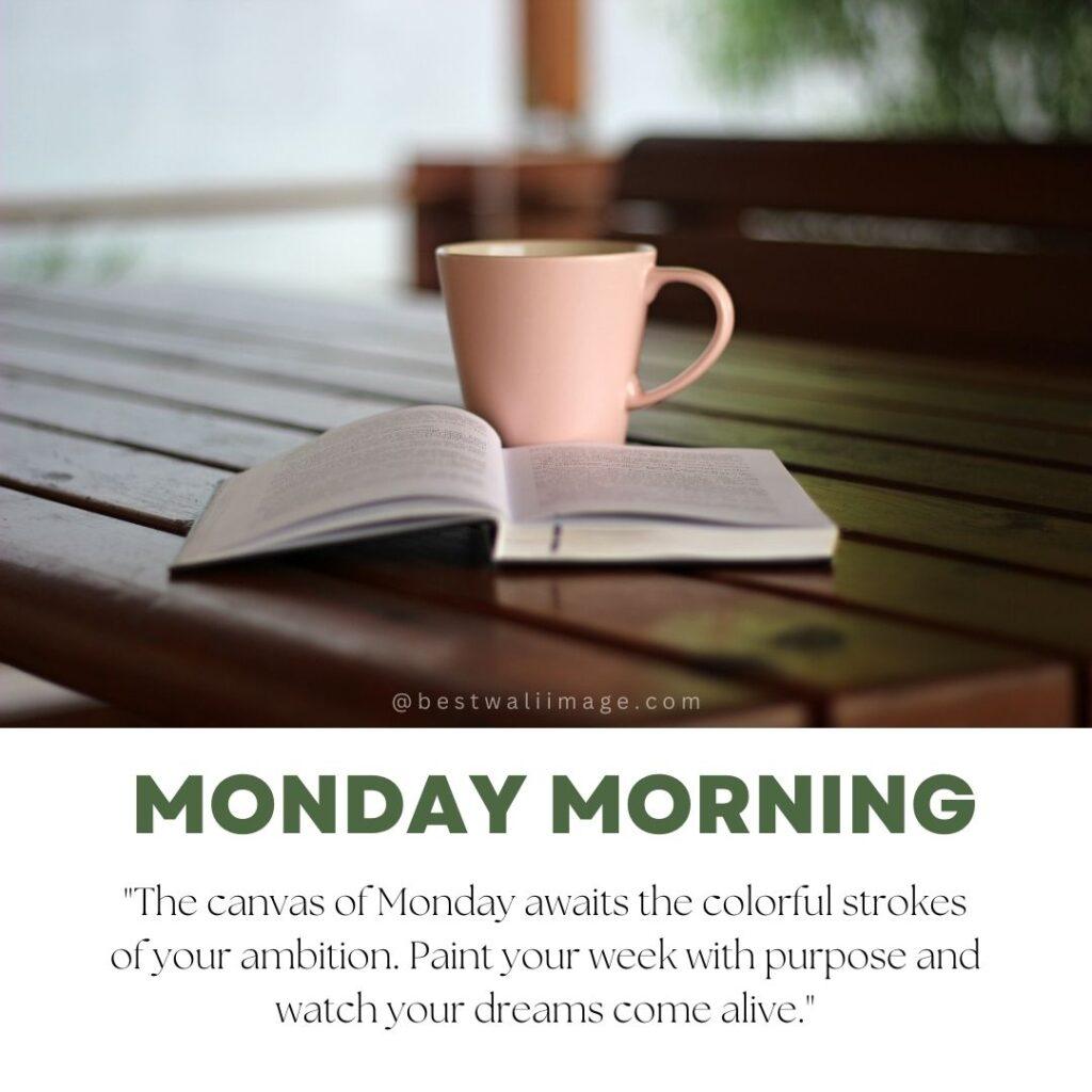 A cup of steaming coffee next to a notepad with the quote, _Let Monday inspire you to set new goals and conquer new heights